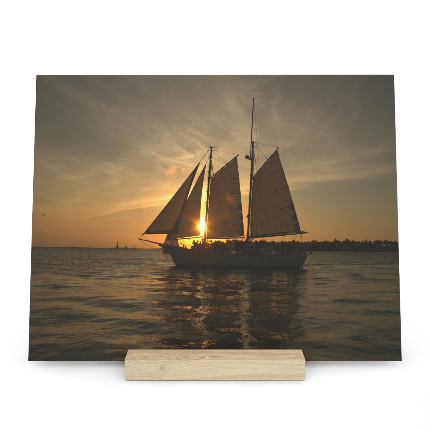 Sailboat Sailing into the Golden Sunset: A Breathtaking Photo Print